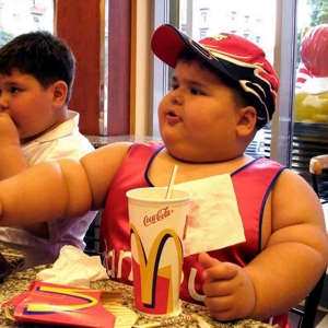 Obese Kid Stuffing - © Fast Food Nation