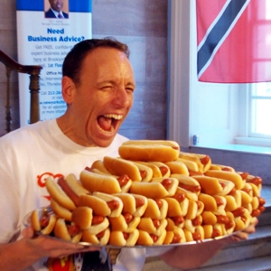 Joey Chestnut and Dogs - © 2017 Nathan's Famous