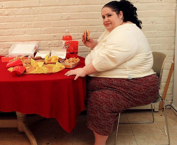 Fat Woman Eating - © Daily Mail