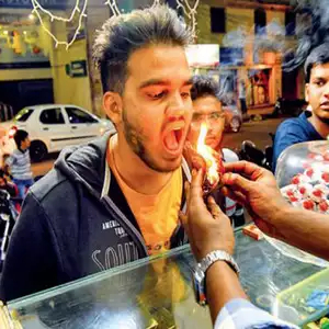 Eating Fire Paan - © Times of India