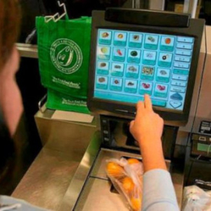 Self-Checkout Woman - © Sydney Morning Herald