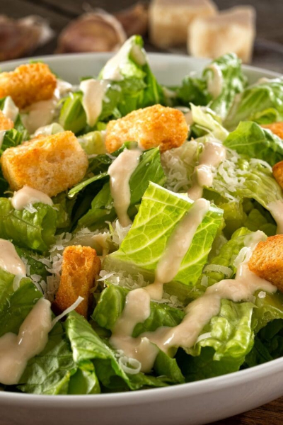 Caesar Salad - © 2023 insanelygoodrecipes.com