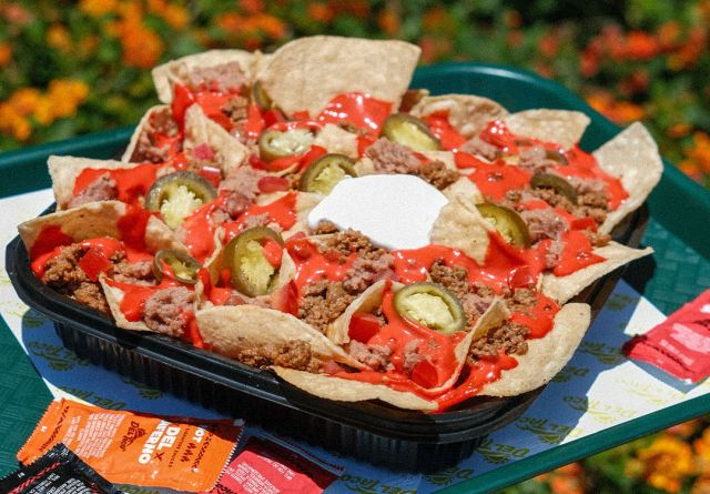 Flamin' Hot Queso - © 2026 Del Taco